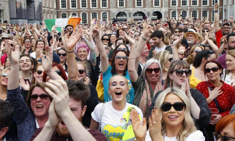 Voters from the ‘yes’ campaign in Dublin react as the results begin to come in