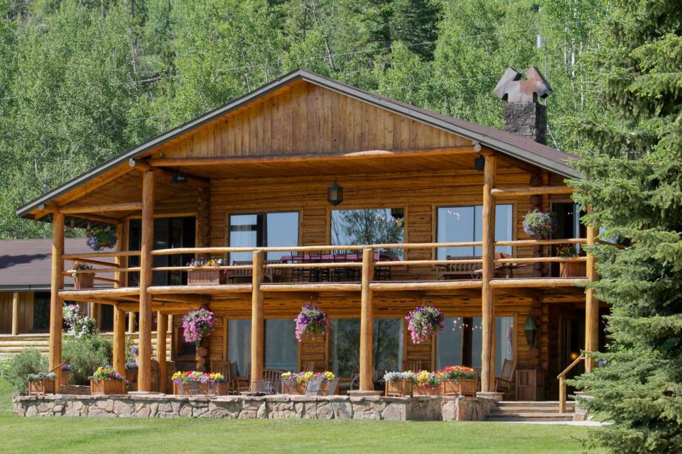 Exterior of a cabin at the C Lazy U guest ranch in Colorado