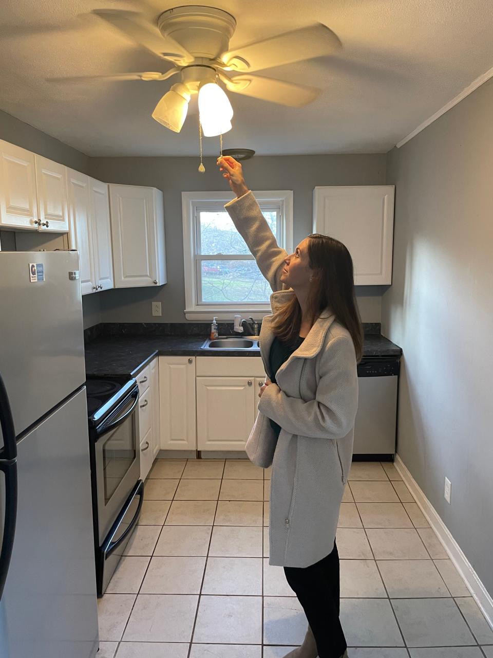 Navick Properties realtor Jackie Kapusta turns on the light in 361 Maple Avenue in Montville, which recently came under contract.