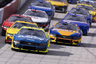 FILE- Ryan Blaney (12) leads the field to start a NASCAR Cup Series auto race, Sunday, March 17, 2024, in Bristol, Tenn. Five races into NASCAR’s 2024 season and Ford is in a funk. Ford cars have been fast, just not quite fast enough to produce any wins yet. (AP Photo/Wade Payne)