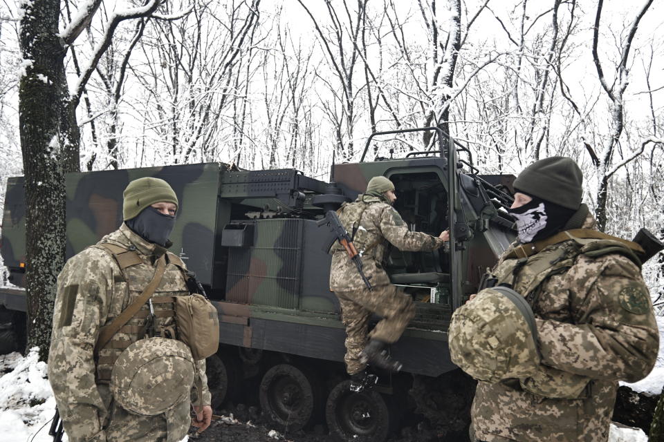 Ukrainian MLRS Multiple Launch Rocket System takes a position on the frontline at an undisclosed location in the Donetsk region, Ukraine, Thursday, Nov. 24, 2022. (AP Photo/Roman Chop)