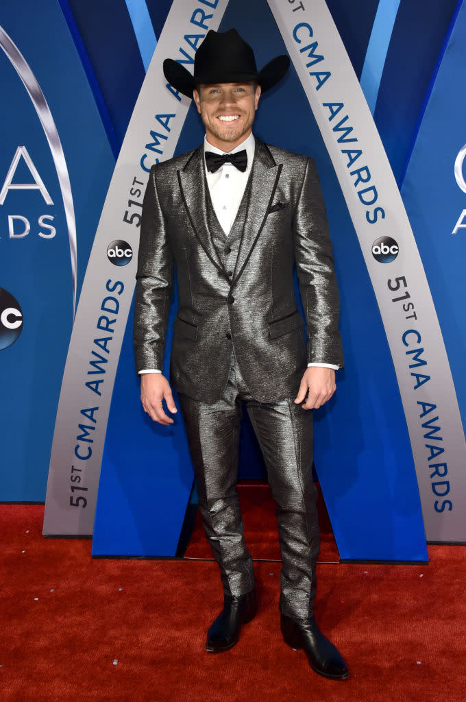 <p>The singer has everyone seeing silver, in a shining monochromatic suit. (Photo: Getty Images) </p>