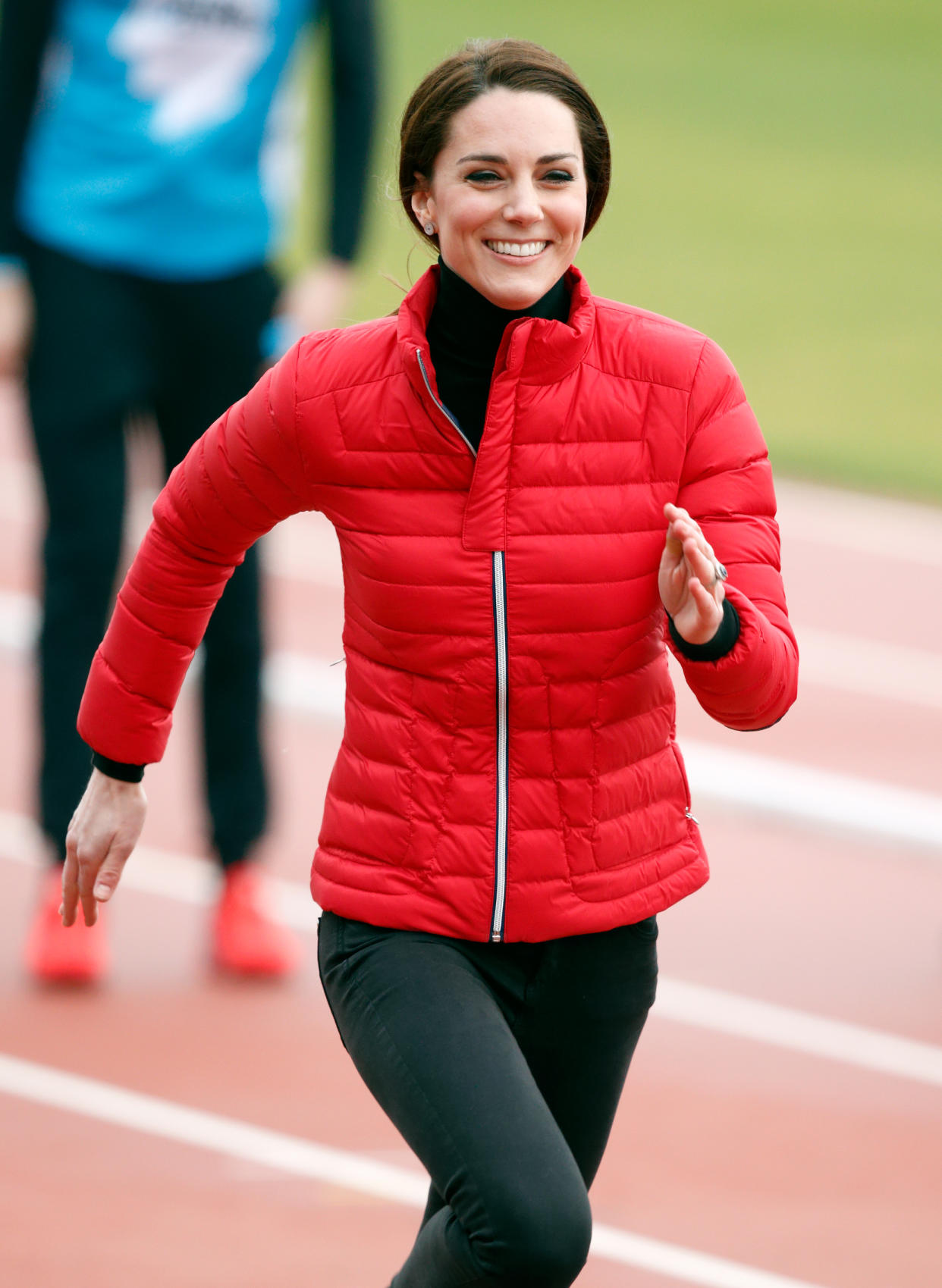 The Duchess of Cambridge went relatively low-key in her training ensemble. She couldn’t resist the spendy earrings, however. (Photo: Getty Images)