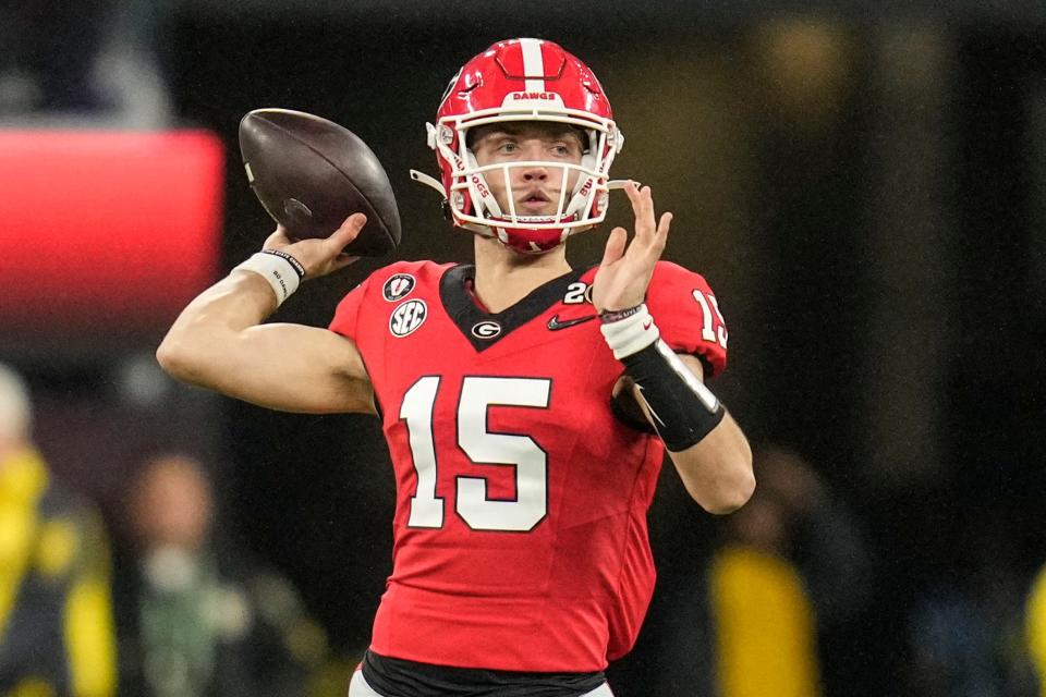 Georgia quarterback Carson Beck (15) passes in the pocket against TCU during the second half of the national championship NCAA College Football Playoff game, Monday, Jan. 9, 2023, in Inglewood, Calif. (AP Photo/Ashley Landis)