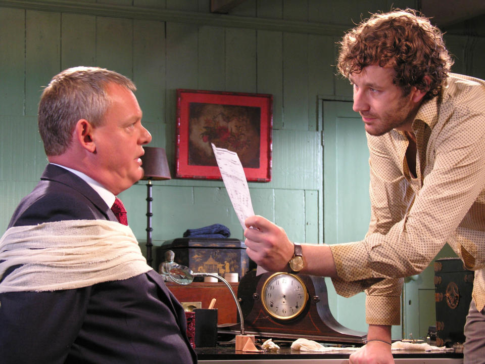 Doc Martin (Martin Clunes) was held hostage by Jonathan (Chris O'Dowd). (ITV/Shutterstock)