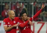 Football Soccer - Bayern Munich v Arsenal - UEFA Champions League Round of 16 First Leg - Allianz Arena, Munich, Germany - 15/2/17 Bayern Munich's Thiago Alcantara celebrates scoring their third goal with Arjen Robben Reuters / Michael Dalder Livepic