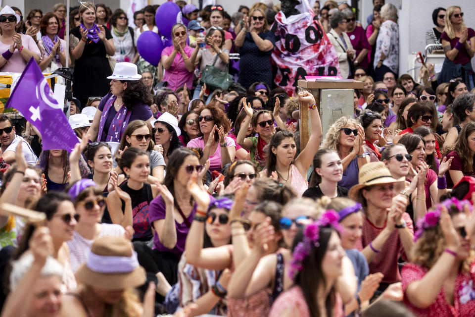 Women protest during a nationwide women's strike in Lucerne, Switzerland, June 14, 2019. There is list of several reasons motivating people to take part in the strike. These range from unequal wages to pressures on part-time employees, the burden of household work and sexual violence. (Alexandra Wey/Keystone via AP)