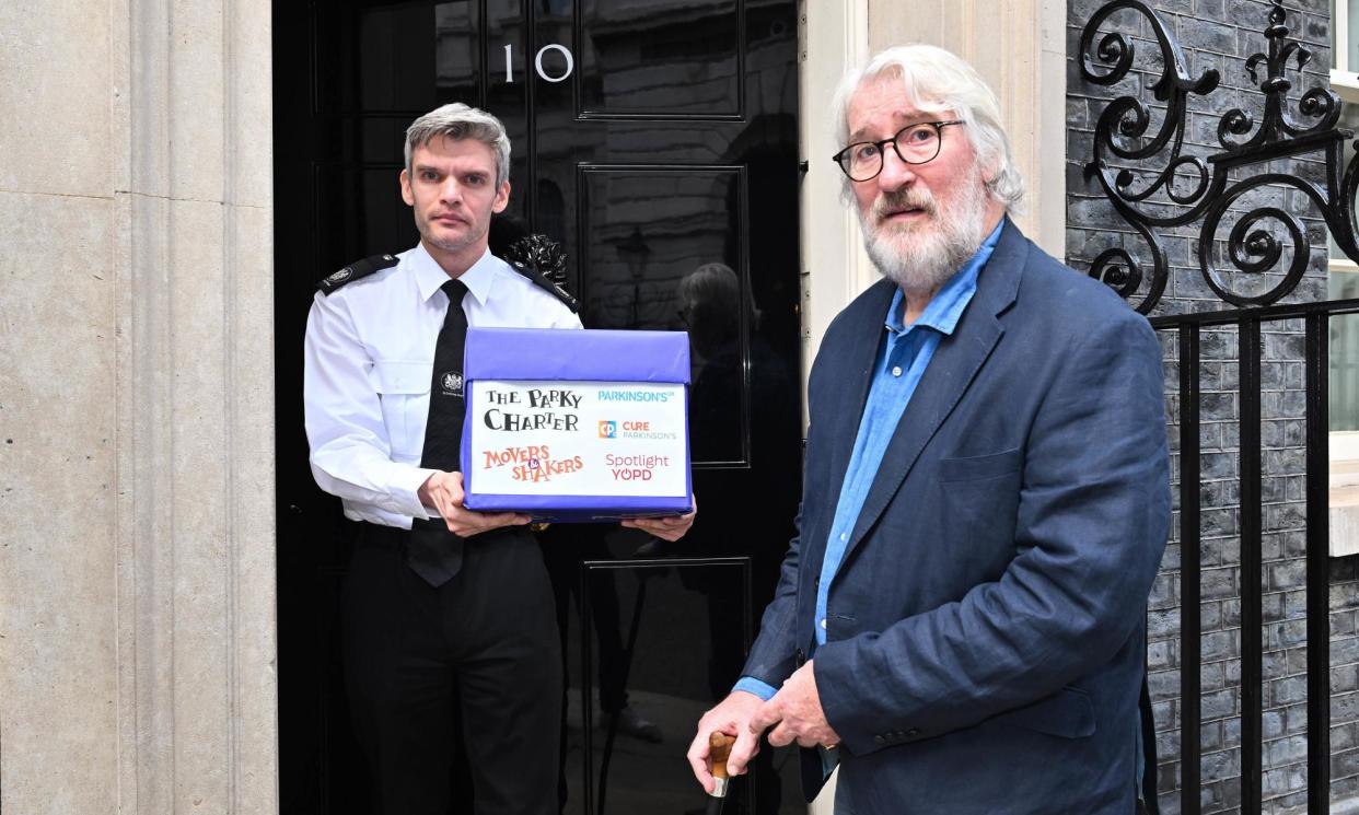 <span>Jeremy Paxman marks World Parkinson's Day by handing in the Parky Charter to Downing Street earlier this month.</span><span>Photograph: Matt Crossick/PA Media Assignments/PA</span>