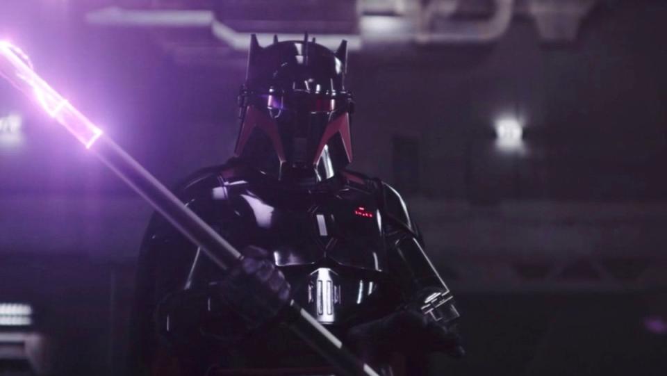 Moff Gideon in his full armor with spiked helmet holding a spear with purple electrical currents at the end on The Mandalorian