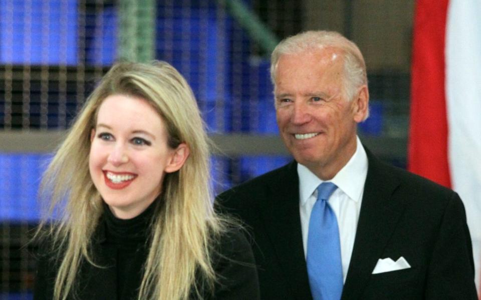 NEWARK, CALIFORNIA - JULY 23: Elizabeth Holmes, founder and CEO of Theranos, and Vice President Joe Biden, from left, arrive for a panel discussion during a visit to Theranos manufacturing in Newark, Calif., on Thursday, July 23, 2015. Biden toured the facility and took part in a roundtable discussion on preventive health care, innovation and the role of the private sector in expanding access. Theranos makes a inexpensive, less painful finger-prick system to draw blood for tests. It can be used in a drug store and potentially at home. (Photo by Anda Chu/MediaNews Group/East Bay Times via Getty Images) - Anda Chu/MediaNews Group/East Bay Times via Getty Images