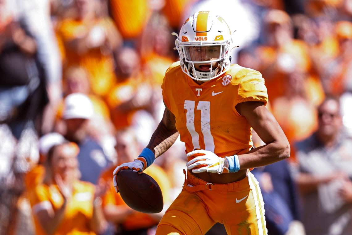 Tennessee wide receiver Jalin Hyatt (11) runs for a touchdown after catching a pass from Princeton Fant during the first half of an NCAA college football game against the Tennessee Martin Saturday, Oct. 22, 2022, in Knoxville, Tenn. (AP Photo/Wade Payne)