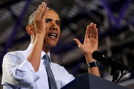 U.S. President Barack Obama participates in a "Get Out the Early Vote" campaign event for Hillary Clinton in Columbus, Ohio, U.S., November 1, 2016. REUTERS/Jonathan Ernst/Files