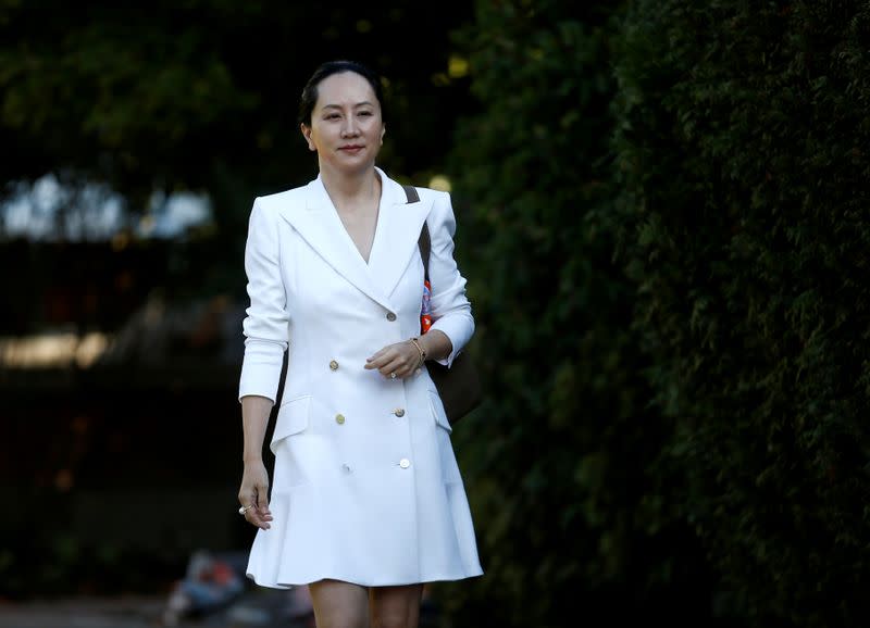 FILE PHOTO: Huawei Technologies Chief Financial Officer Meng Wanzhou leaves her home to appear in British Columbia supreme court in Vancouver