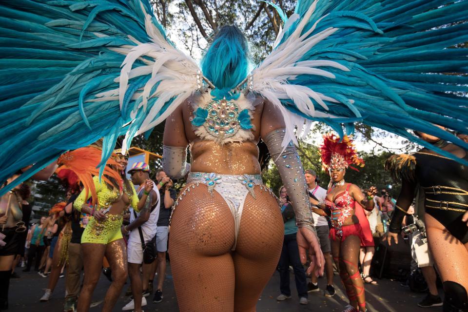 People participate in the annual Gay and Lesbian Mardi Gras parade in Sydney on March 3, 2018.  Rainbow colours beamed from faces and floats parading through Sydney March 3 as hundreds of thousands of partygoers celebrated 40 years of the annual Gay and Lesbian Mardi Gras. / AFP PHOTO / SAEED KHAN        (Photo credit should read SAEED KHAN/AFP/Getty Images)