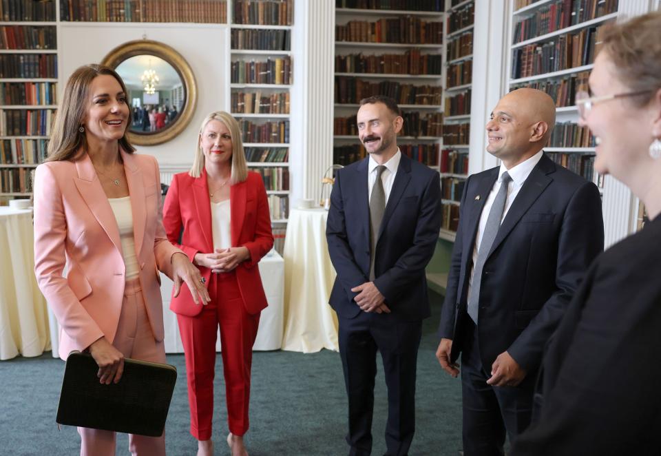 (left to right) The Duchess of Cambridge, Chief Executive of Ipsos Kelly Beaver, Secretary of State for Health and Social Care Sajid Javid (second right) and the Royal Foundation Centre for Early Childhood host a roundtable at the Royal Institution in London. Picture date: Thursday June 16, 2022.