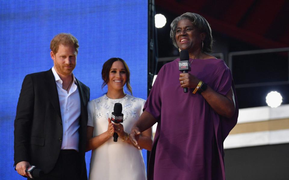 Prince Harry and Meghan Markle listen as US Ambassador to the United Nations Linda Thomas-Greenfield speaks - AFP