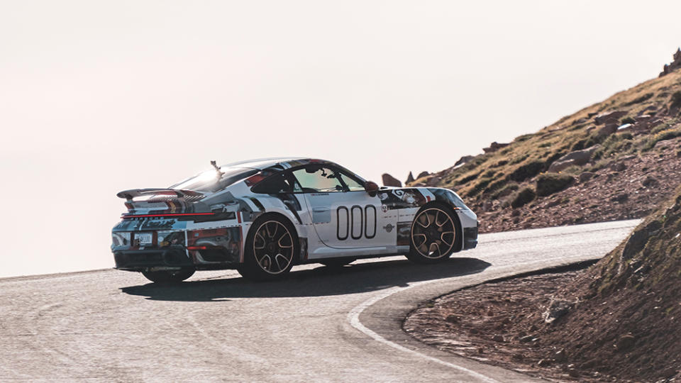 A rear 3/4 view of the record-setting #000 team Porsche 911 Turbo S