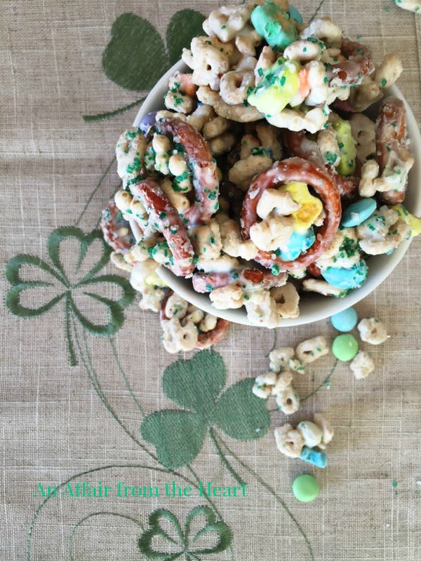 <p>An Affair From the Heart</p><p>Lucky Charms Cereal, pretzels, M&M’s and yogurt-covered raisins coated in almond bark and sprinkled green. Who could resist this??</p><p><strong>Get the recipe: <a href="https://anaffairfromtheheart.com/lucky-leprechaun-bait/" rel="nofollow noopener" target="_blank" data-ylk="slk:Lucky Leprechaun Bait;elm:context_link;itc:0;sec:content-canvas" class="link rapid-noclick-resp">Lucky Leprechaun Bait</a></strong></p>