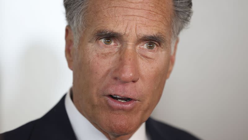 Sen. Mitt Romney speaks to reporters following an event with the Utah Aerospace and Defense Association in Sandy on Feb. 23, 2023. Romney will appear on “Meet the Press” on Sunday.