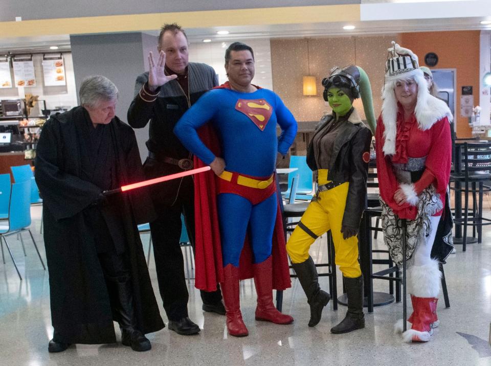 Cosplayers decked out in their finest fantasy attire invade the Pensacola Intergalactic Airport for a renaming ceremony to kick off the city's preparations for the 2024 Pensacon on Friday, Feb. 9, 2024. Pensacon is an annual pop culture convention celebrating science fiction, fantasy, and comic book culture.
