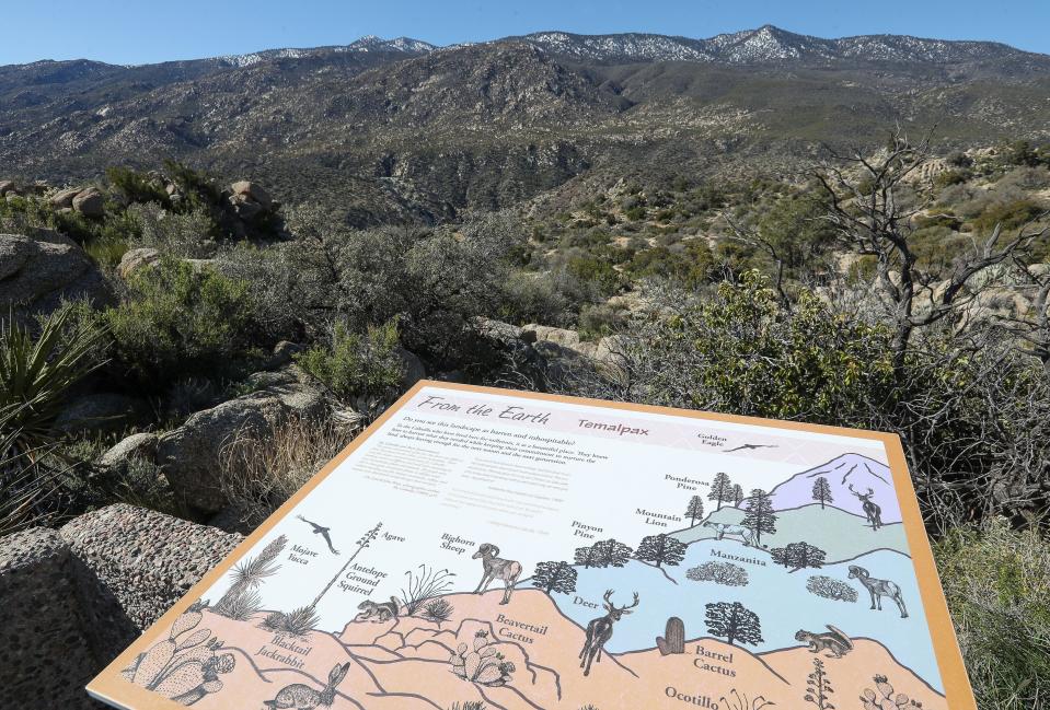An informational display overlooks the landscape of the Santa Rosa National Monument at the Cahuilla Tewanet scenic overlook on Hwy 74, April 6, 2023. 