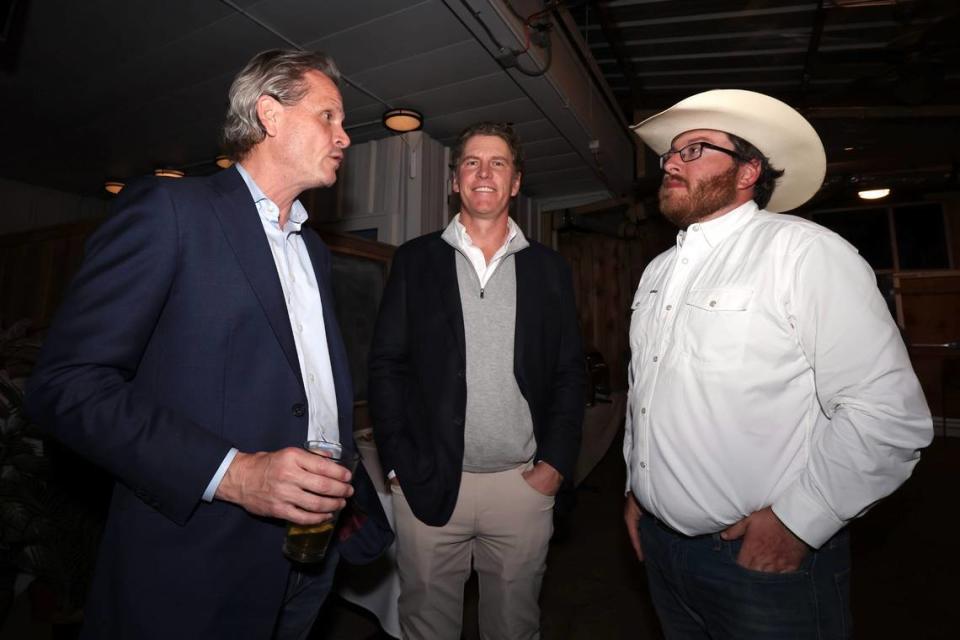 Congressional District 12 candidate John O’Shea speaks with Tarrant County GOP Chairman Bo French and Cary Cheshire, president and treasurer of Tarrant County Patriots PAC, at O’Shea’s election watch party at the Fitzgerald in Fort Worth on Tuesday, March 5, 2024.