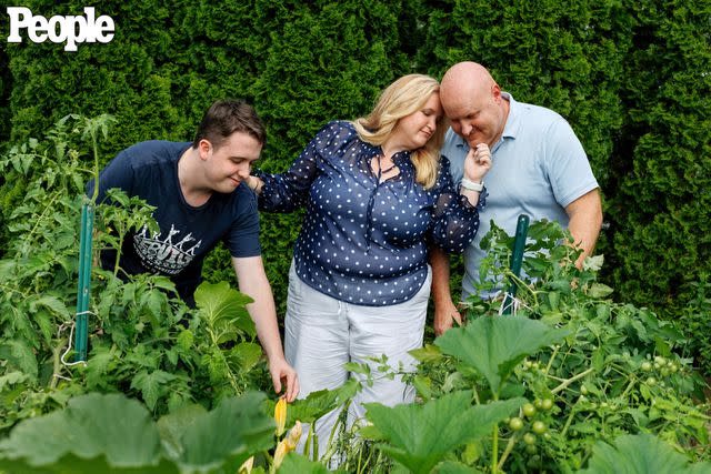 <p>Laura McDermott</p> “I’ve found healing,” says Meyer (in July 2023) with husband Nick and her son Robert in the family’s backyard.