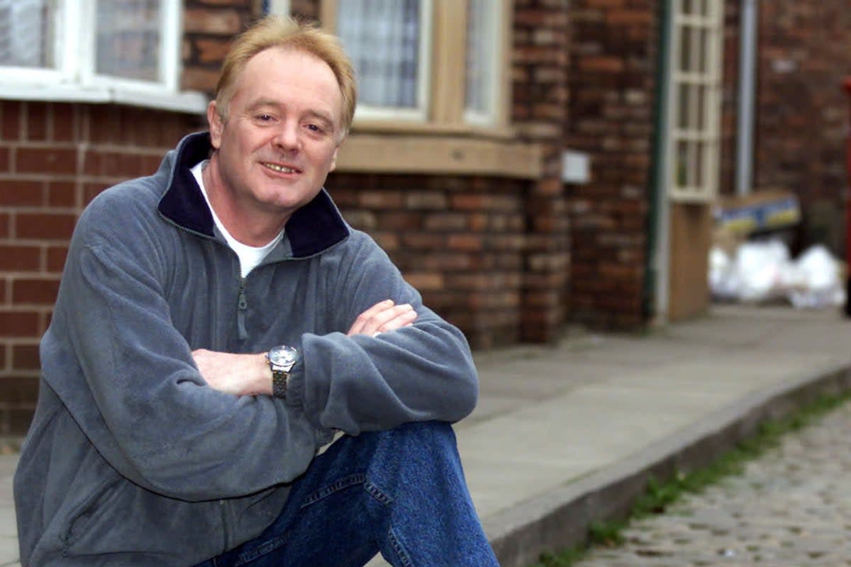 Bruce Jones pictured on the Coronation Street set in 2000 (PA)