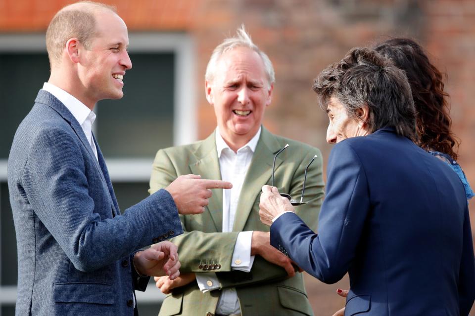 Prince William, Duke of Cambridge talks with Ronnie Wood