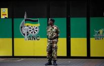 A member of the Umkhonto We Sizwe Military Veterans Association (MKMVA) stands guard at the ANC headquarters in downtown Johannesburg, South Africa, September 5, 2016. REUTERS/Siphiwe Sibeko