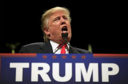 U.S. Republican presidential candidate Donald Trump speaks to voters at a rally at the The Myrtle Beach Sports Center in Myrtle Beach, South Carolina, February 19, 2016. REUTERS/Randall Hill