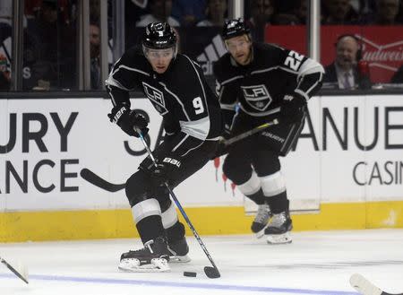 October 18, 2017; Los Angeles, CA, USA; Los Angeles Kings left wing Adrian Kempe (9) moves the puck against the Montreal Canadiens during the second period at Staples Center. Mandatory Credit: Gary A. Vasquez-USA TODAY Sports