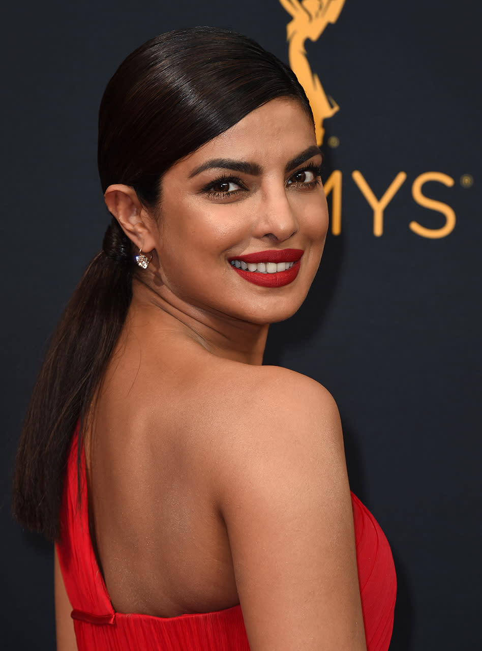 <p><b>Priyanka Chopra</b></p><p>The <i>Quantico</i> star has thick, luscious hair, but sometimes you just want to keep it under wraps for the evening. (Photo: AP Images)</p>