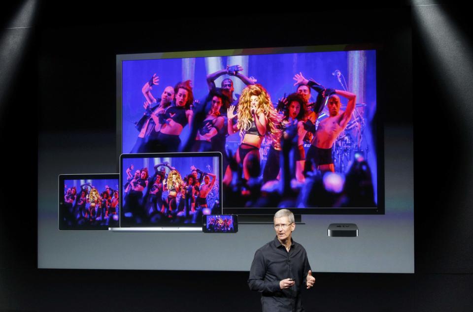 Apple Inc CEO Tim Cook talks about the iTunes Festival during Apple Inc's media event in Cupertino, California September 10, 2013. (REUTERS/Stephen Lam)