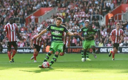 Football - Southampton v Swansea City - Barclays Premier League - St Mary's Stadium - 26/9/15 Swansea's Gylfi Sigurdsson scores their first goal from the penalty spot Mandatory Credit: Action Images / Alan Walter Livepic EDITORIAL USE ONLY. No use with unauthorized audio, video, data, fixture lists, club/league logos or "live" services. Online in-match use limited to 45 images, no video emulation. No use in betting, games or single club/league/player publications. Please contact your account representative for further details.