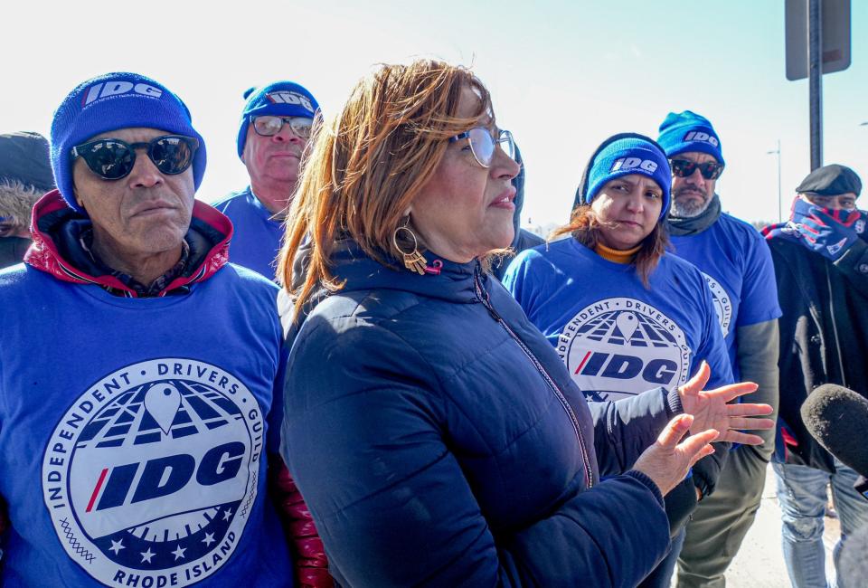 Senator Ana B. Quezada joins Independent Drivers Guild members at T. F. Green Airport.