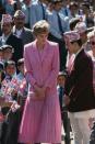 <p>In March 1993, Diana sported this pretty pink blazer over a polka dot dress during a visit to a school in Nepal.<br></p>