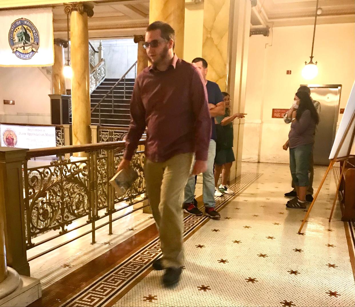 Damian Hauschultz, 17, enters the Manitowoc County Courthouse on Thursday, Sept. 2, 2021 before his sentencing in the death of foster brother Ethan Hauschultz, 7.