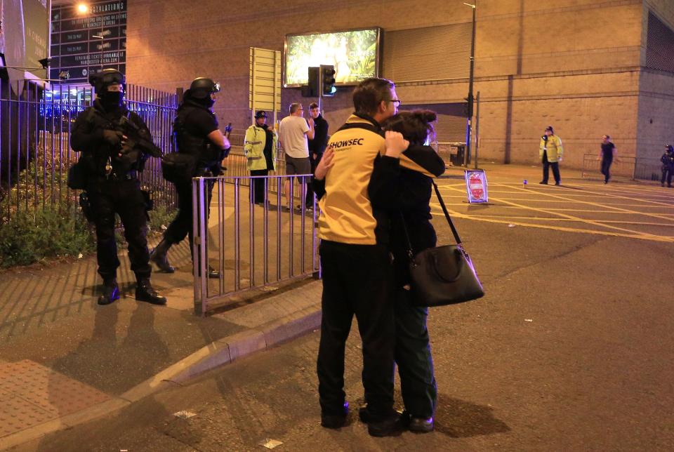 Armed police at Manchester Arena after reports of an explosion at the venue.