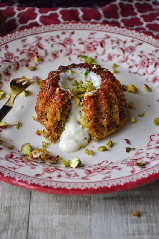 <p>The flavor combination of pistachios, rosewater and cinnamon gives it an Arabic touch to it.</p><p><strong>Get the recipe: <a href="https://savoryandsweetfood.com/2015/11/05/pistachio-cake-with-mohallabieh-cream/" rel="nofollow noopener" target="_blank" data-ylk="slk:Pistachio Cake with Mohallabieh Cream;elm:context_link;itc:0;sec:content-canvas" class="link ">Pistachio Cake with Mohallabieh Cream</a></strong></p>