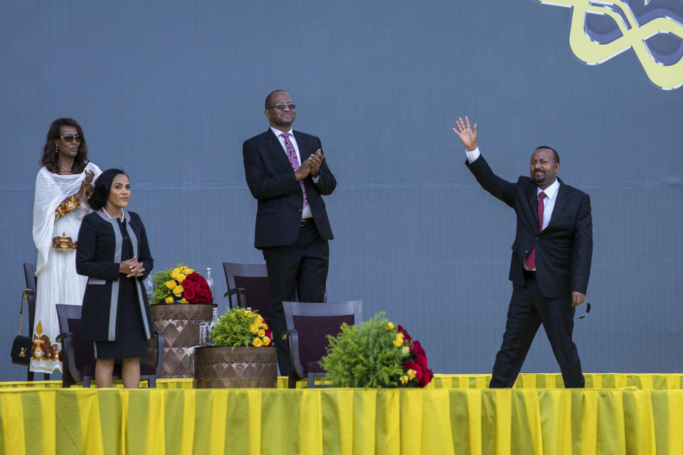 FILE - Ethiopia's Prime Minister Abiy Ahmed, right, and First Lady Zinash Tayachew, left, attend his inauguration ceremony after he was sworn in for a second five-year term, in the capital Addis Ababa, Ethiopia Monday, Oct. 4, 2021. Prime Minister Abiy Ahmed has gone to the battlefront to lead his country's military forces, his government announced Wednesday, Nov. 24, 2021. (AP Photo/Mulugeta Ayene, File)