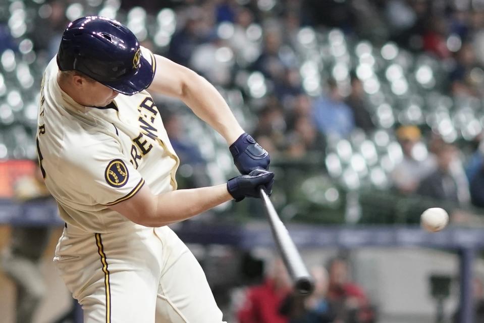 Milwaukee Brewers' Joey Wiemer hits a single during the seventh inning of a baseball game against the San Diego Padres Tuesday, April 16, 2024, in Milwaukee. (AP Photo/Morry Gash)