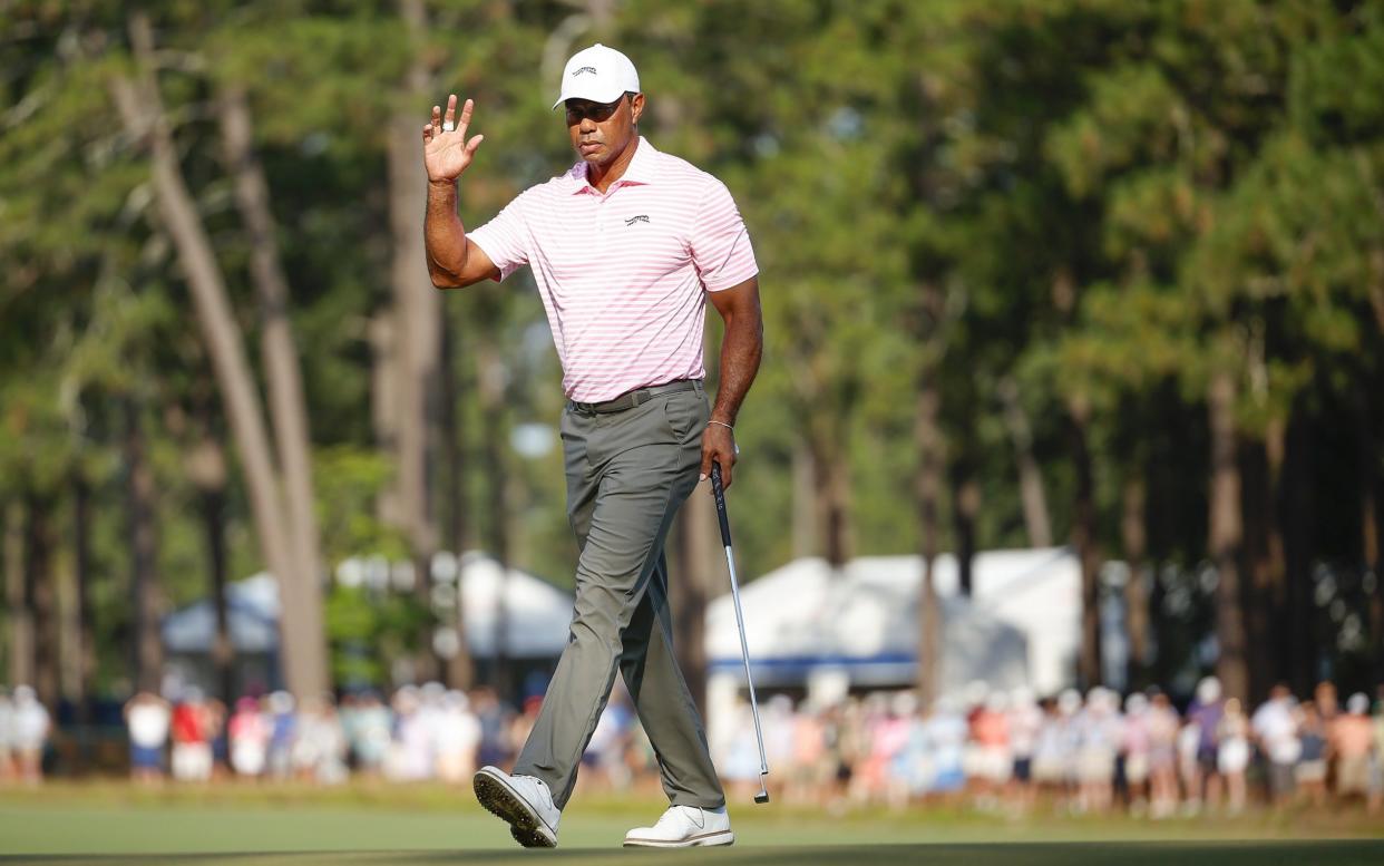 Tiger Woods acknowledges the crowd