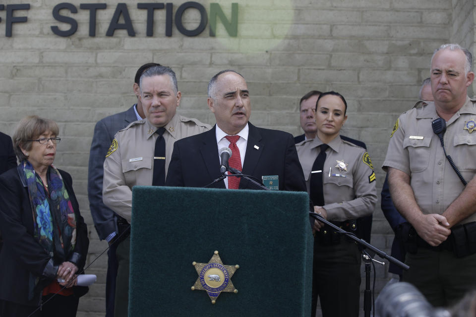 Santa Clarita Mayor Marsha McLean, far left, Los Angeles Sheriff Sheriff Alex Villanueva, left, Detective Daniel Finn, at podium, and Deputy James Callahan, far right, take questions from the media at a news conference at the station Santa Clarita, Calif., Friday, Nov. 15, 2019. (AP Photo/Damian Dovarganes)