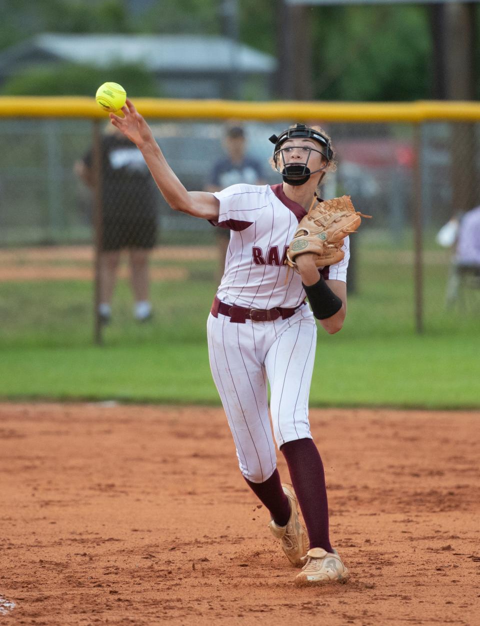 Shortstop Harmony  Stafford (3) throws to first for an out during the Gulf Breeze vs Navarre softball game at Navarre High School on Tuesday, April 26, 2022.