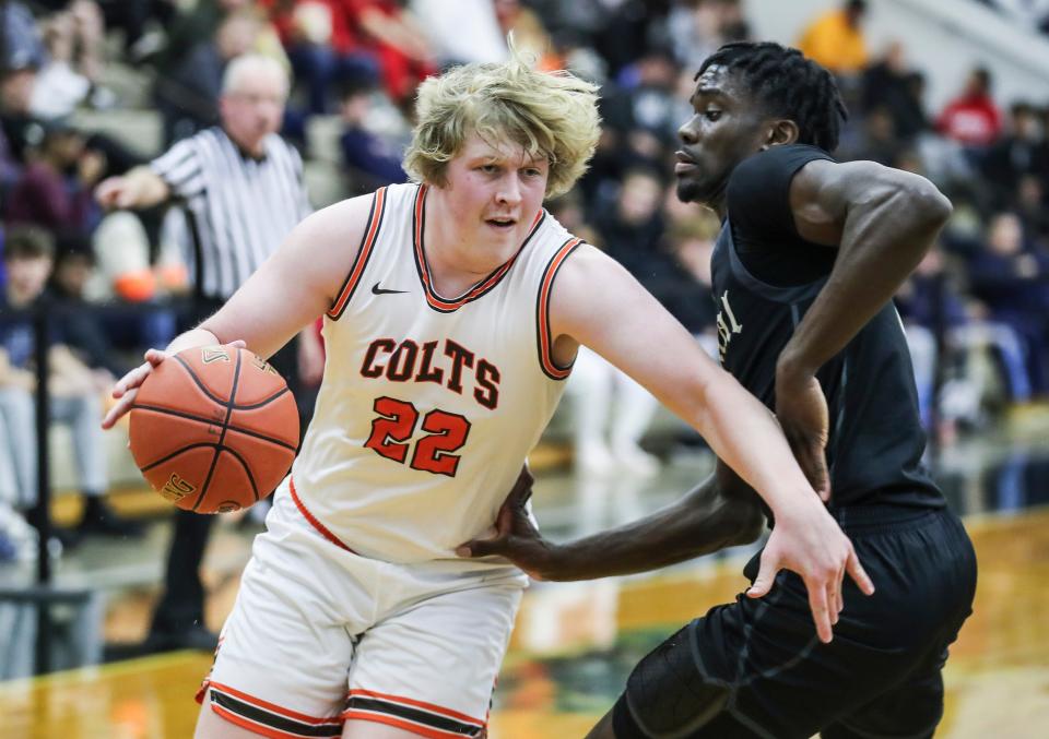 DeSales' Will Gibson drives on Little Rock Central's Annor Boateng at the King of the Bluegrass tournament Thursday at Fairdale High School.