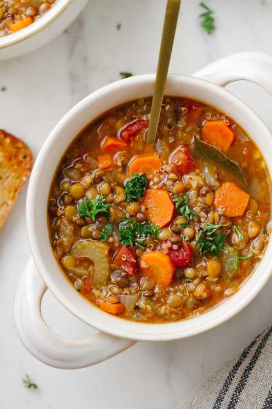 <p>Simple Veganista</p><p>This homemade smoky soup recipe is vegan, nutrient-dense, filling and a perfect lunch or supper. Using staple ingredients, it’s super easy to make in one pot and includes a slow cooker option too.</p><p><strong>Get the recipe: <a href="https://simple-veganista.com/smoky-lentil-quinoa-soup/" rel="nofollow noopener" target="_blank" data-ylk="slk:Smoky Lentil and Quinoa Soup;elm:context_link;itc:0;sec:content-canvas" class="link ">Smoky Lentil and Quinoa Soup</a></strong></p>
