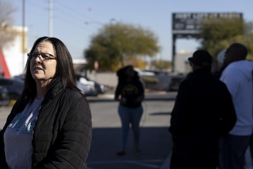 Pamela Browning, who has a loved one in a Nevada prison camp, speaks to reporters during a news conference outside the Nevada Department of Corrections Casa Grande Transitional Housing Center, Friday, Dec. 9, 2022 in Las Vegas. A group, including members of prison reform organization Return Strong, gathered to support the inmates at Ely State Prison who are on a hunger strike over what they say are abusive and violent conditions there. (Ellen Schmidt/Las Vegas Review-Journal via AP)