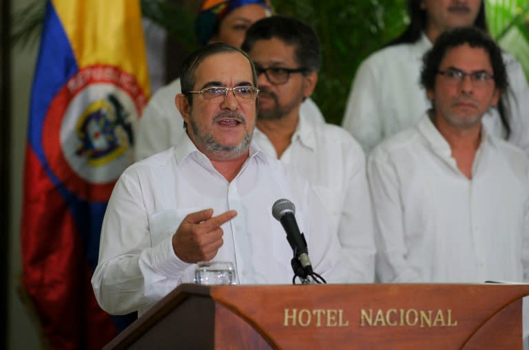 The head of Colombia's FARC rebel force, Timoleon Jimenez, aka "Timochenko" (C), speaks during a press conference with other members of his delegation in Havana on August 28, 2016