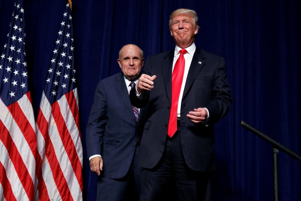 Rudy Giuliani campaigns with Donald Trump in South Carolina in 2016.  This year, Giuliani recommended that Trump allies begin arguing that Joe Biden is mentally ill. 